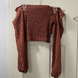 Red floral blouse size large